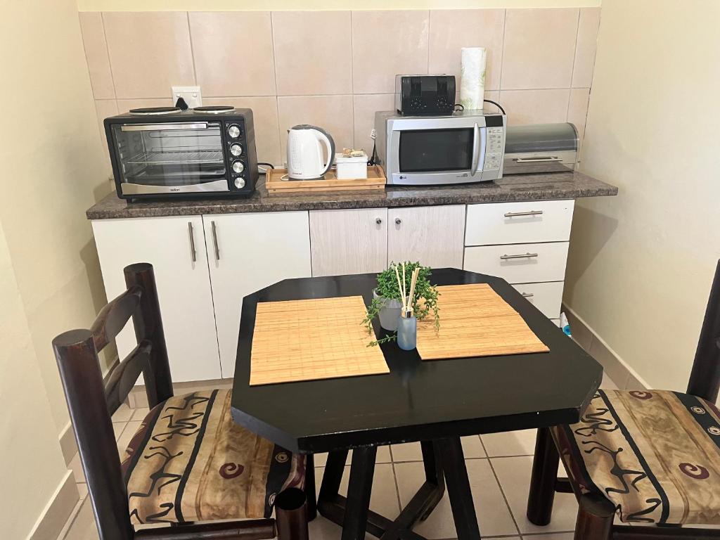 Køkken eller tekøkken på Dube Villa