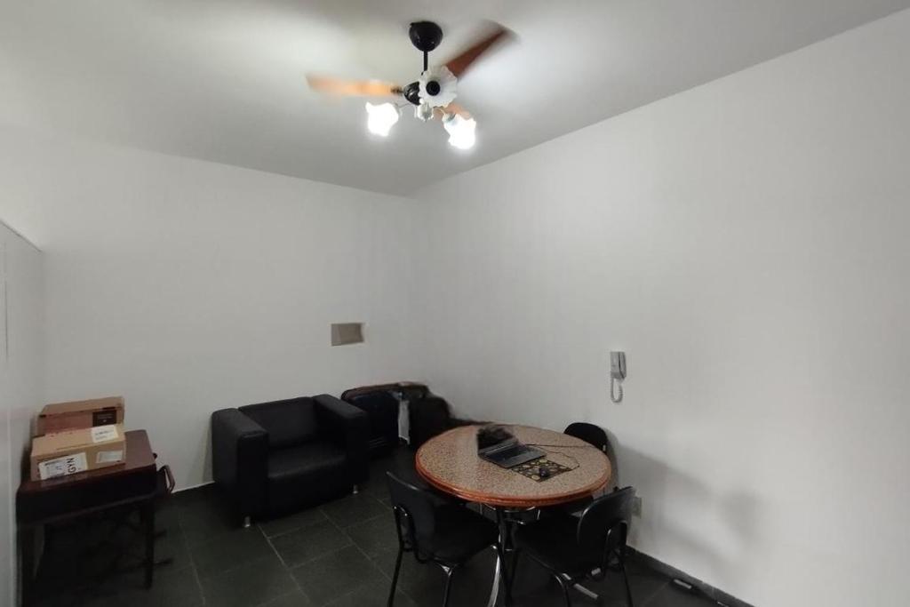 Et opholdsområde på Acomodação Tranquila