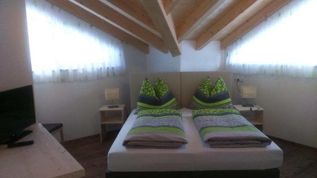 Postel nebo postele na pokoji v ubytování Alpenflair