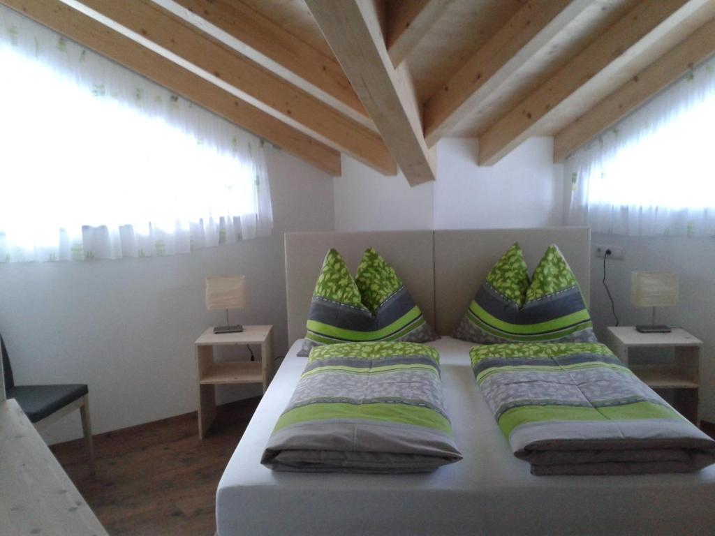 Postel nebo postele na pokoji v ubytování Alpenflair