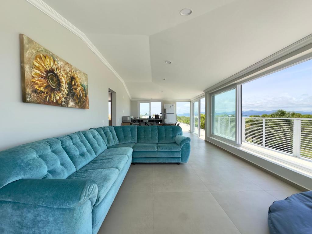 Et opholdsområde på Apê dos Sonhos - Capri Morada & Mar - Vista Mar