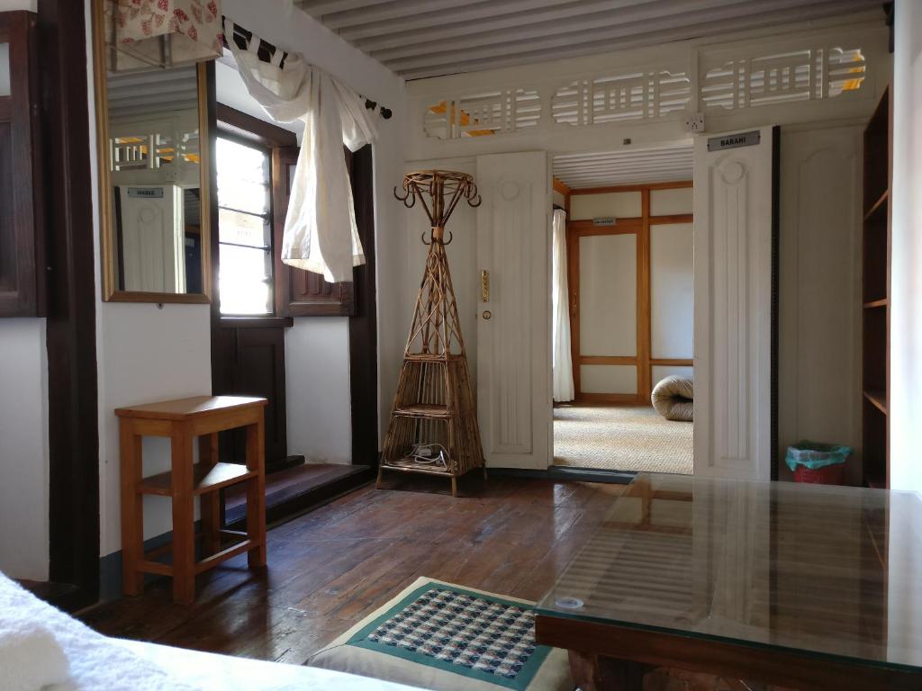 Postel nebo postele na pokoji v ubytování Hiranya Guest House