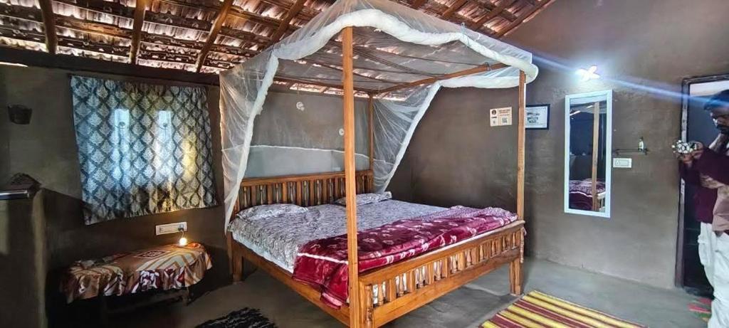 En eller flere senge i et værelse på Shree Namami Home stay