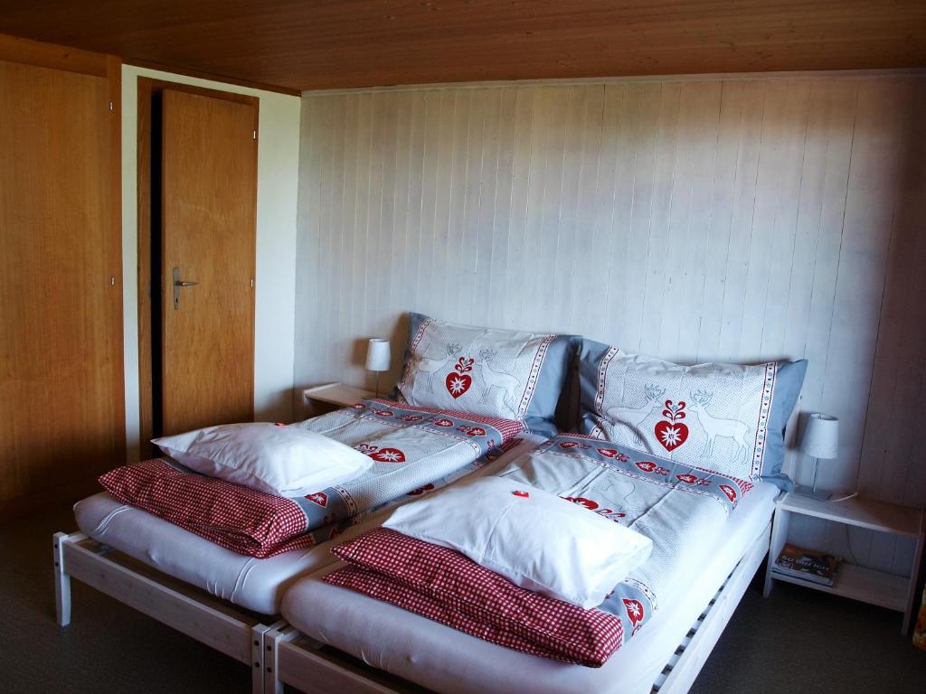 Postel nebo postele na pokoji v ubytování Gasthof Engelberg