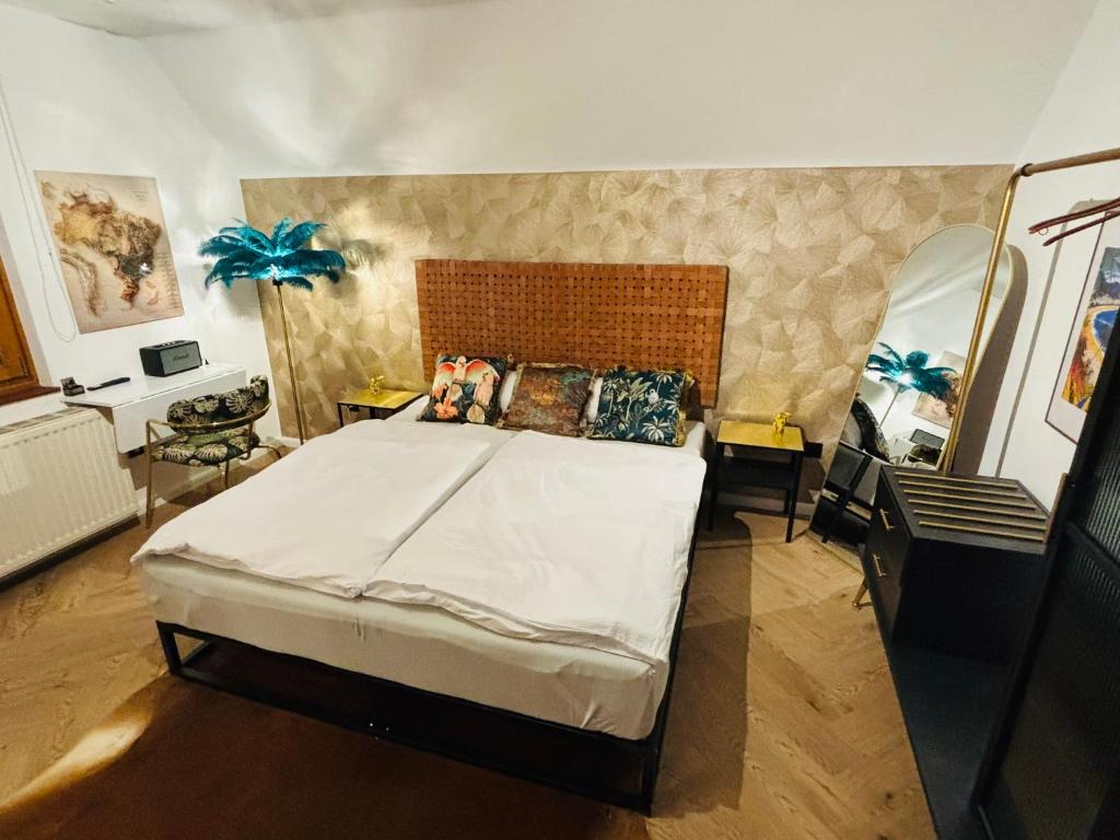 Postel nebo postele na pokoji v ubytování CASA Salzburg