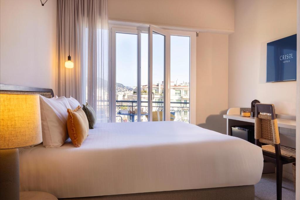 Postel nebo postele na pokoji v ubytování Crisol Promenade