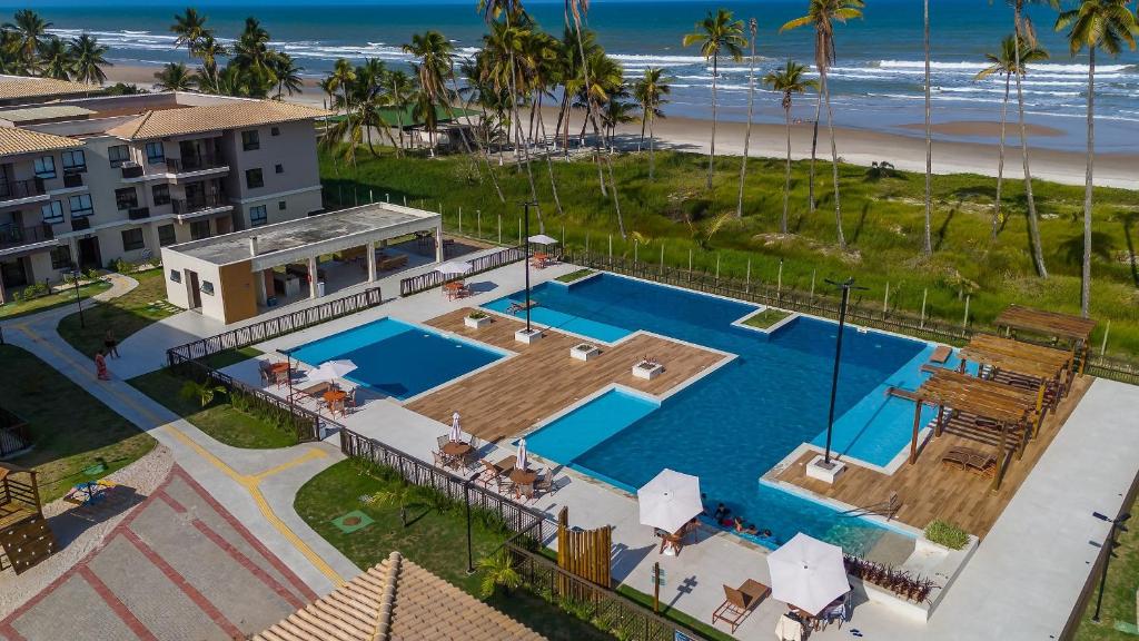 Bazén v ubytování Viva com Conforto e Clima de Resort - Pé na areia nebo v jeho okolí