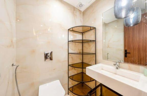 a bathroom with a toilet and a sink and a shower at Stay tanger in Tangier