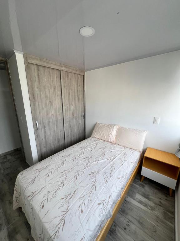 Giường trong phòng chung tại Mavile ViSa