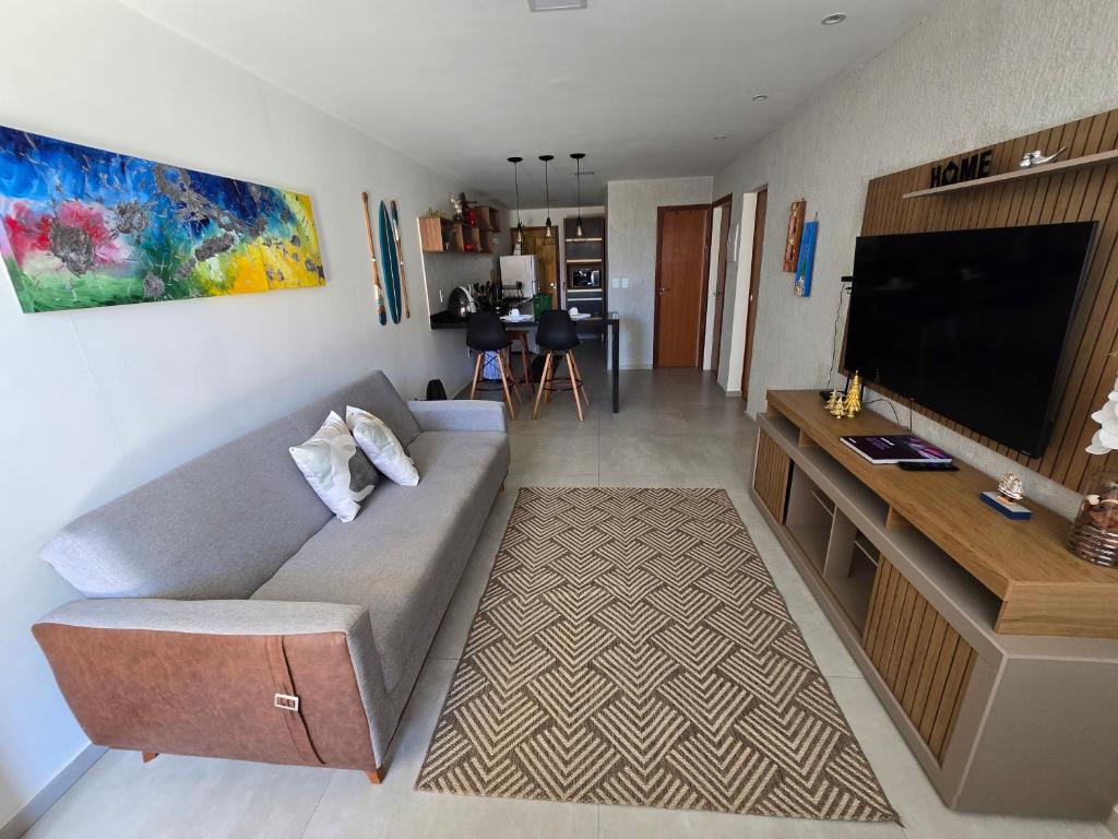 TV a/nebo společenská místnost v ubytování Casa Pérola de Marataízes 40 metros da praia