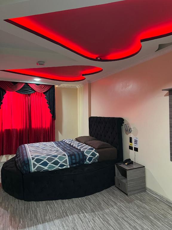 Postel nebo postele na pokoji v ubytování Hostal Los Alpes Guamaní