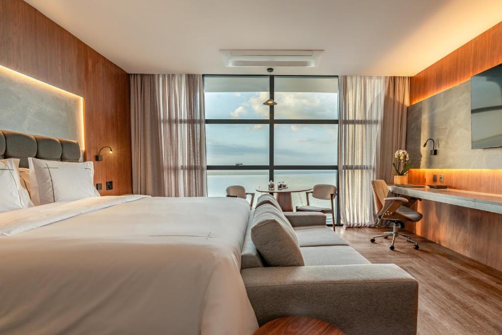 En eller flere senge i et værelse på Tivoli Maiorana Belém Pará Hotel