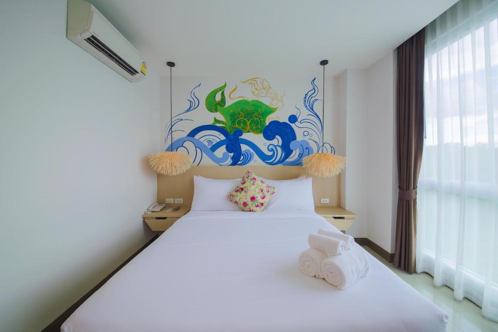 Postel nebo postele na pokoji v ubytování The Sila Hotel