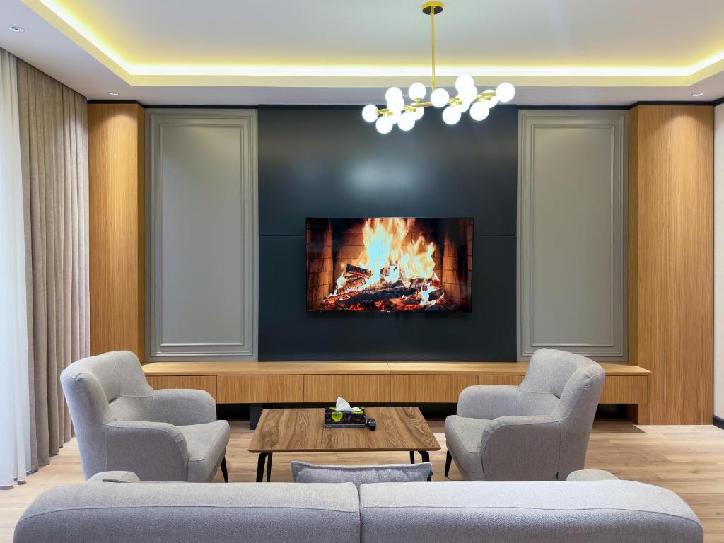 Posezení v ubytování Tashkent Premier Homes With All comfort