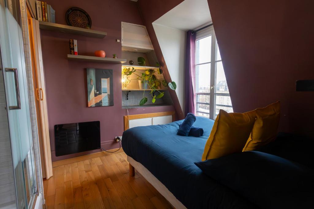 APPARTEMENT CHALEUREUX ARTISTIQUE QUARTIER GARE DU NORD - GARE DE L'EST et GRANDS BOULEVARDS
