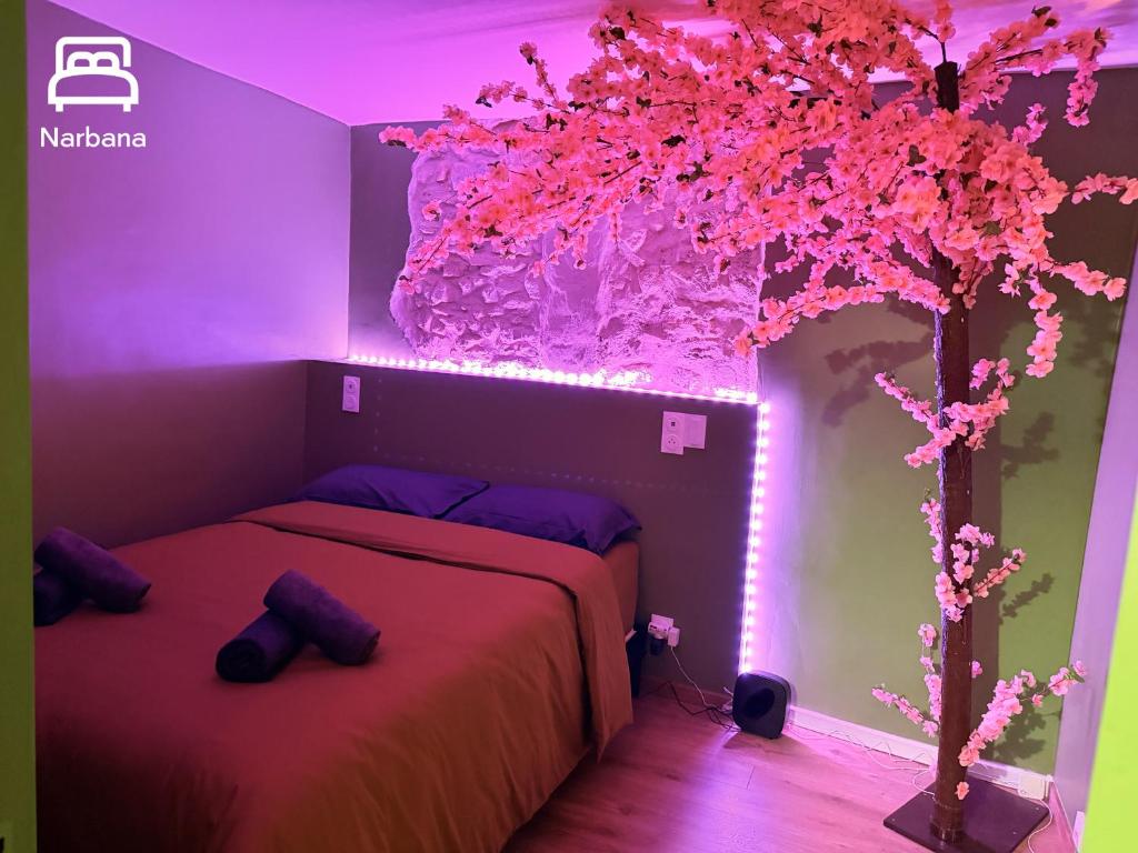 Postel nebo postele na pokoji v ubytování NOUVEAU - JUNGLE SAKURA - 2P - Center - Clim by Narbana