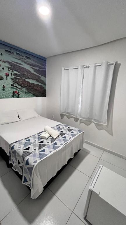 Postel nebo postele na pokoji v ubytování pousada agua viva