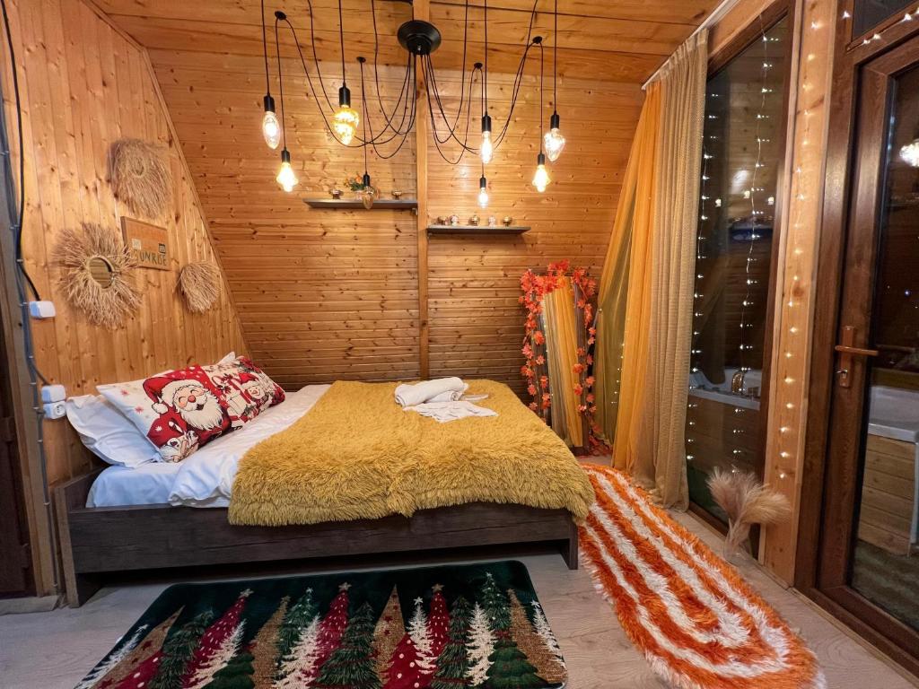 Postel nebo postele na pokoji v ubytování Cottage sunrise merisi