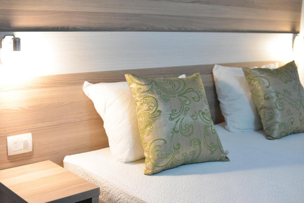 Postel nebo postele na pokoji v ubytování Hotel Rivero A&S