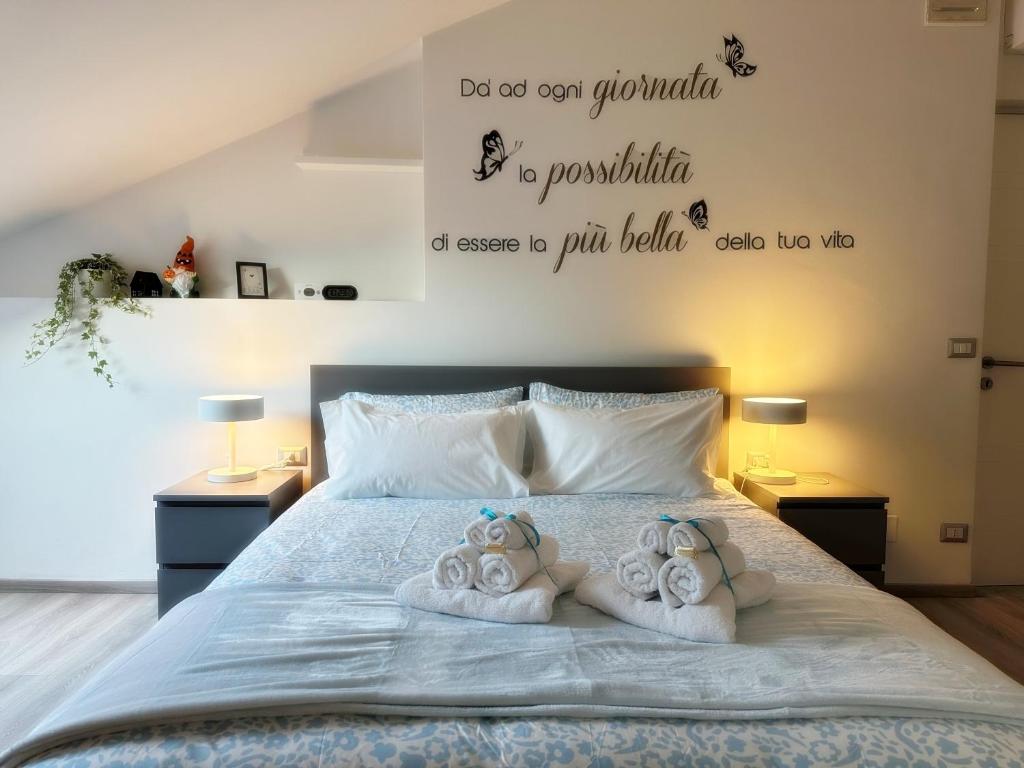 En eller flere senge i et værelse på Turin Dreams