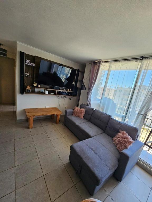 TV a/nebo společenská místnost v ubytování Cómodo departamento