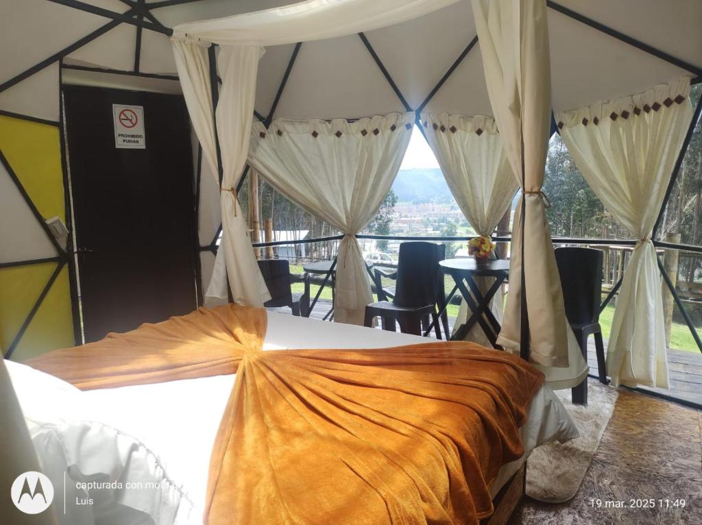 Un balcon sau o terasă la GLAMPING RESERVA CATEDRAL Zipaquira