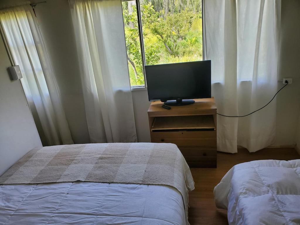 Ένα ή περισσότερα κρεβάτια σε δωμάτιο στο Mini cabaña acogedora en entorno natural