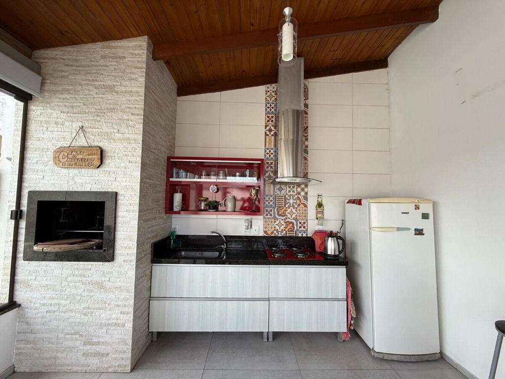 Køkken eller tekøkken på Loft para casal que deseja privacidade