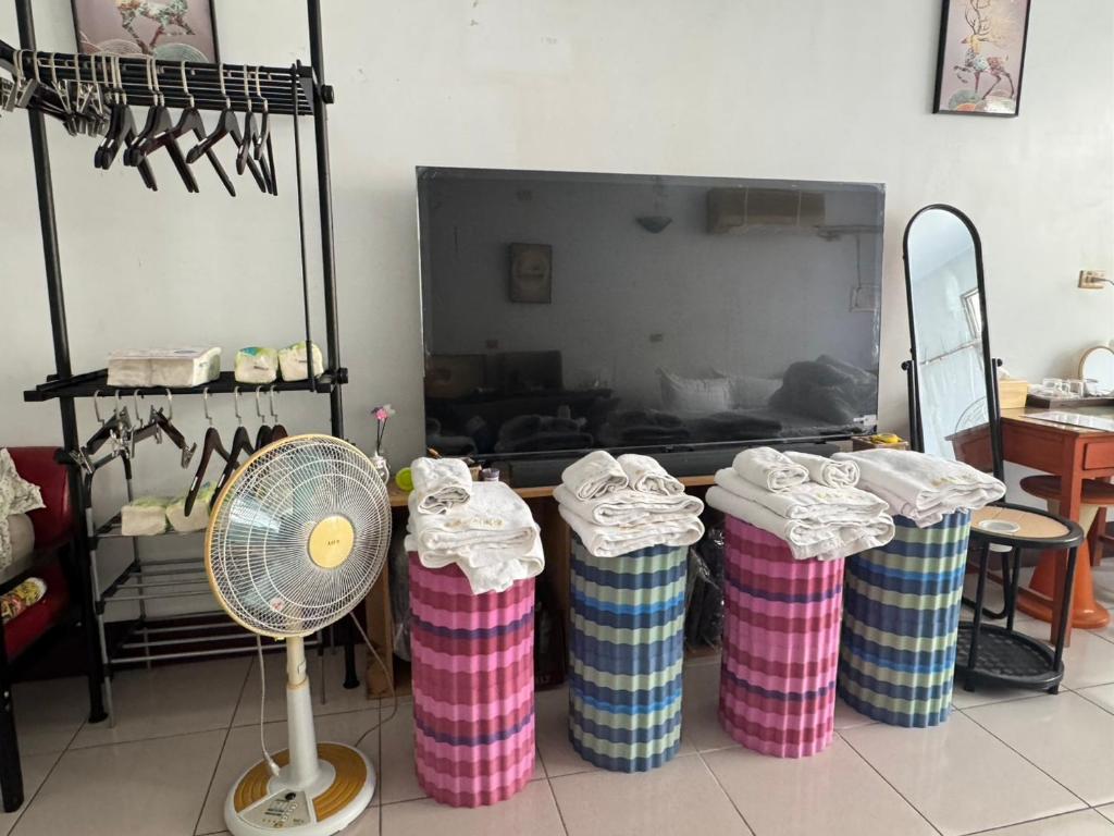 Et tv og/eller underholdning på Lukang Hongyu Hostel