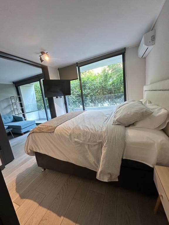 En eller flere senge i et værelse på Adorable department con modernas terminaciones