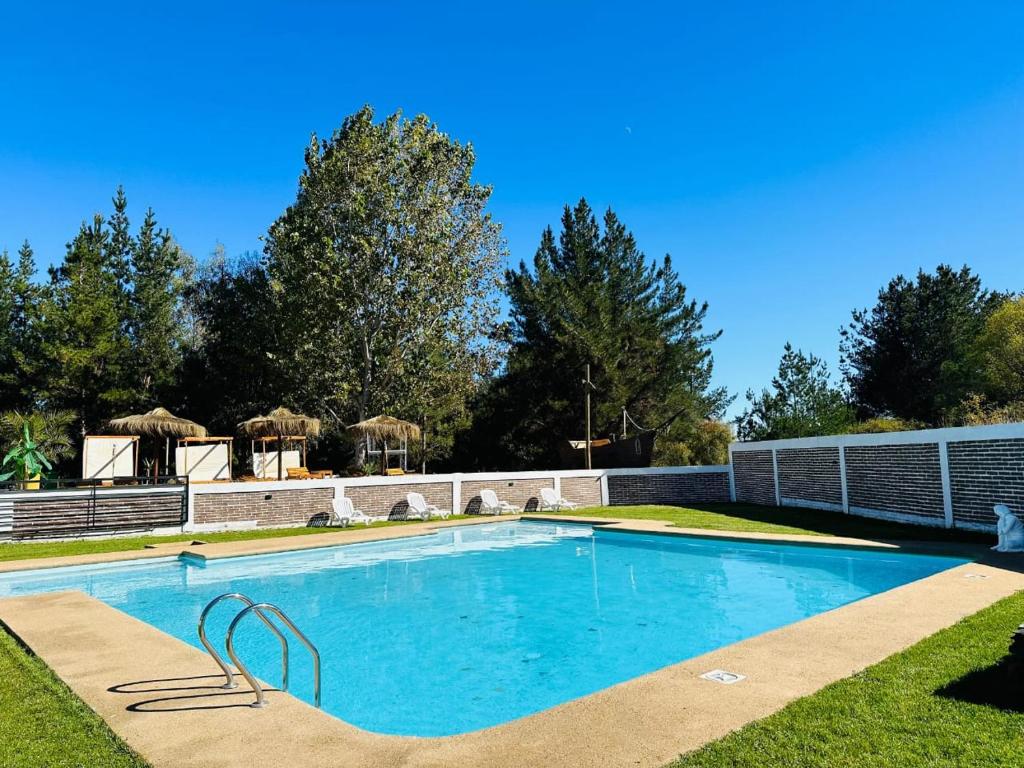 Swimmingpoolen hos eller tæt på Complejo Bosque Escondido