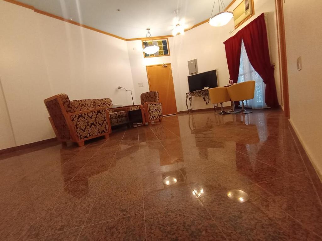 TV/Unterhaltungsangebot in der Unterkunft Qurum Heights Hotel