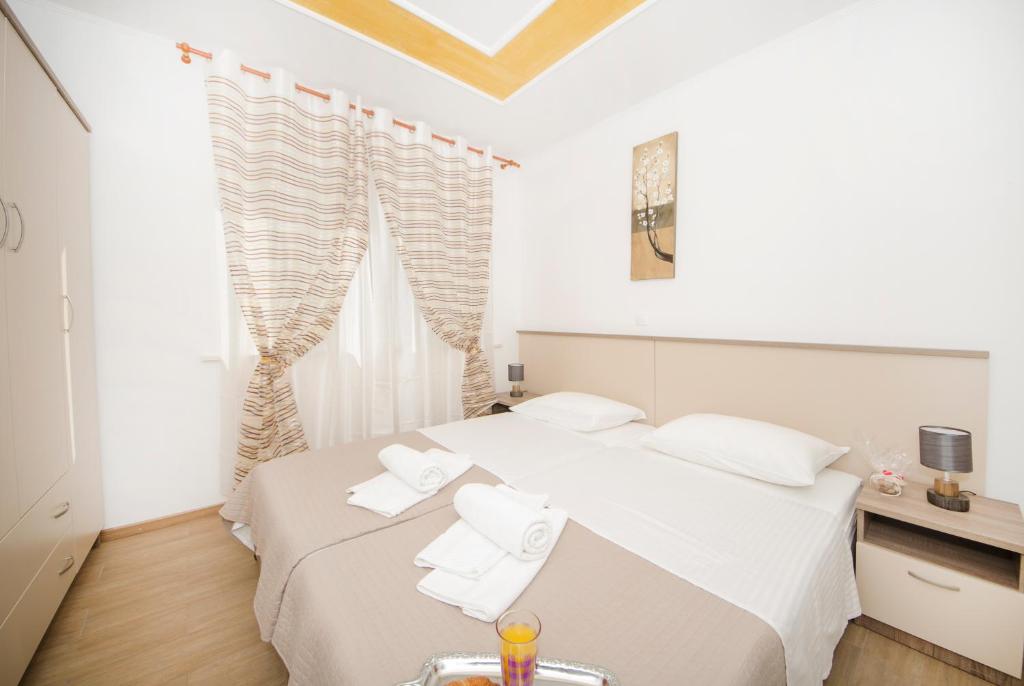 Posteľ alebo postele v izbe v ubytovaní Guest House Mia