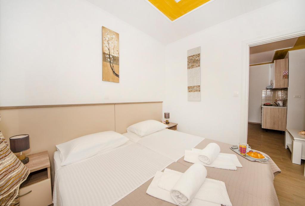 Posteľ alebo postele v izbe v ubytovaní Guest House Mia