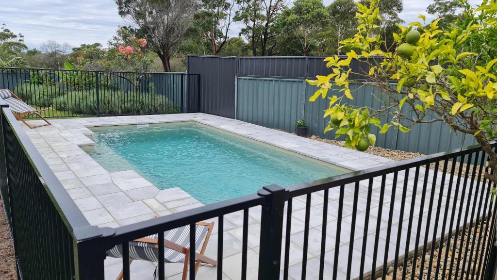 Swimmingpoolen hos eller tæt på Amalena by the sea - Vincentia 5BR home with pool