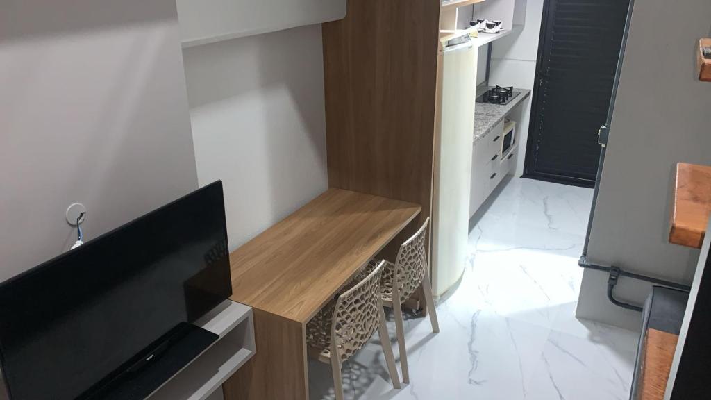 Et tv og/eller underholdning på Beira mar apartamento