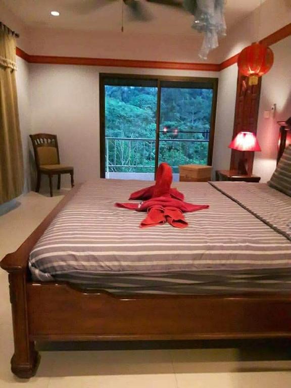 Postel nebo postele na pokoji v ubytování popeta villa