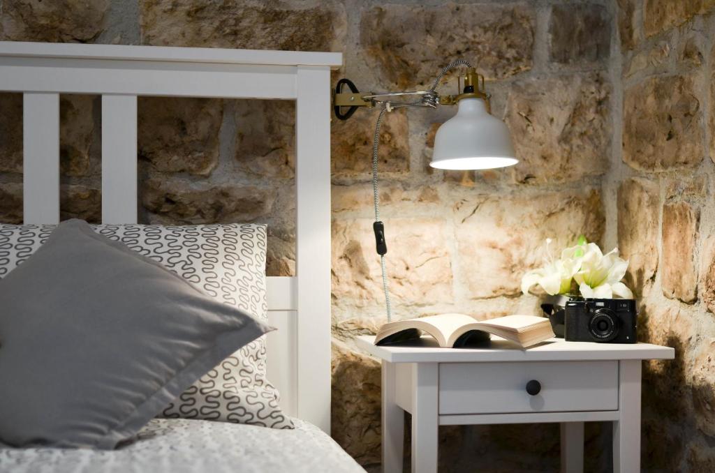 Posteľ alebo postele v izbe v ubytovaní Apartment Fabijanko OldTown