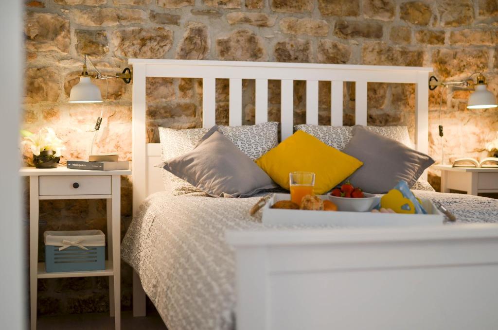 Posteľ alebo postele v izbe v ubytovaní Apartment Fabijanko OldTown