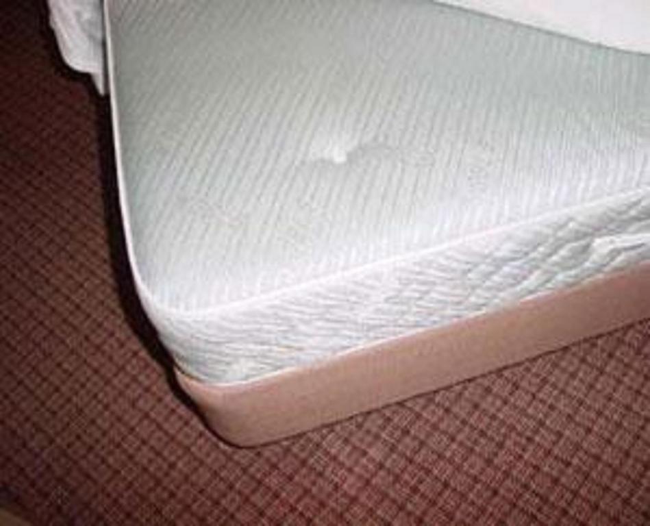 Postel nebo postele na pokoji v ubytování Hotel Tsubame Hills