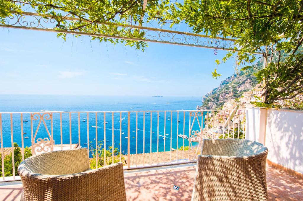 a balcony with a view of the ocean at Casa Cinque in Positano