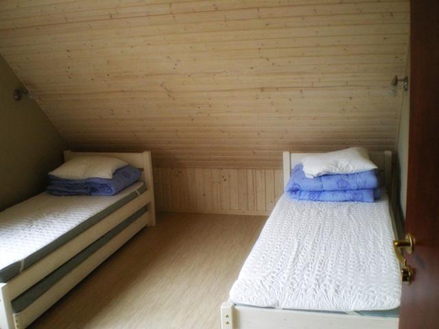 Postel nebo postele na pokoji v ubytování Udumäe Holiday Farm