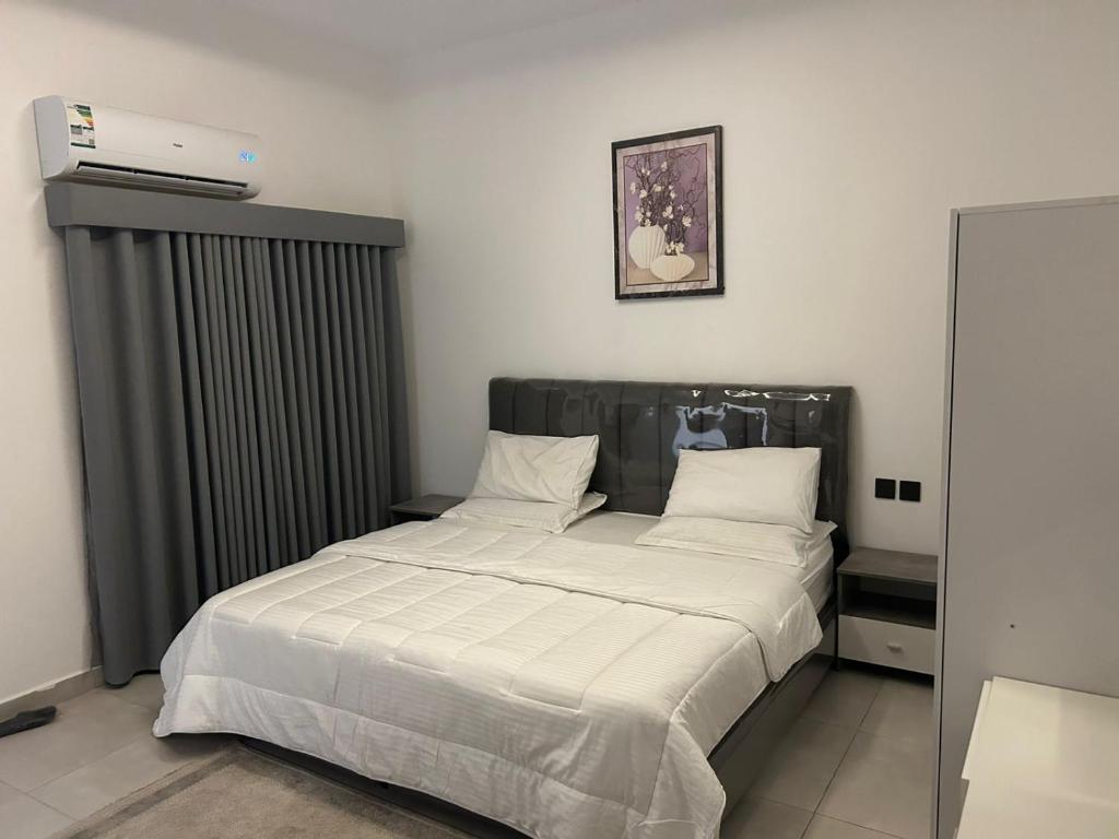 Postel nebo postele na pokoji v ubytování قمرة قباء Quba moon4