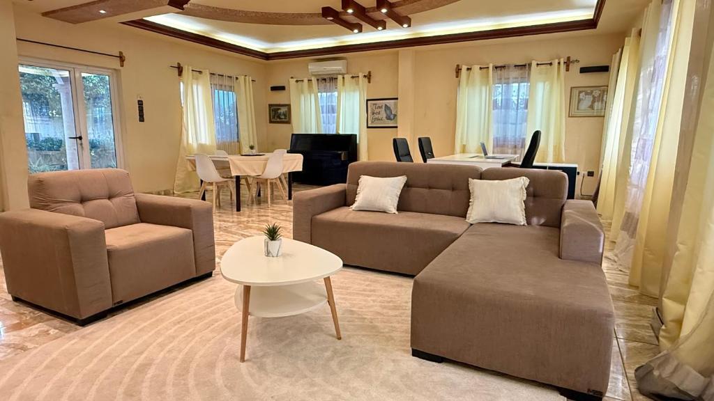 Et opholdsområde på La Maison des Palmiers