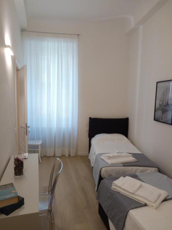 Posteľ alebo postele v izbe v ubytovaní Opera 19 Luxury Apartment