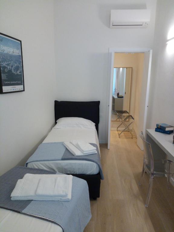 Posteľ alebo postele v izbe v ubytovaní Opera 19 Luxury Apartment