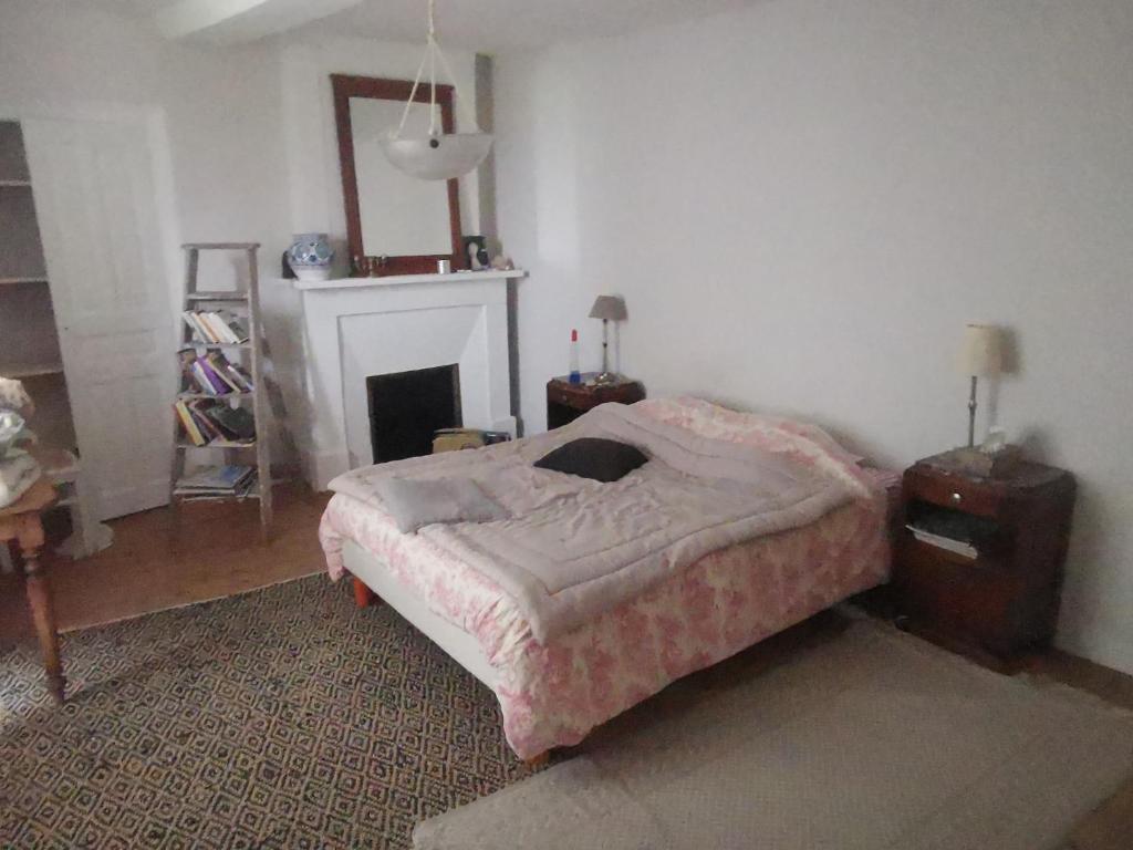 Postel nebo postele na pokoji v ubytování Maison de Famille en Normandie