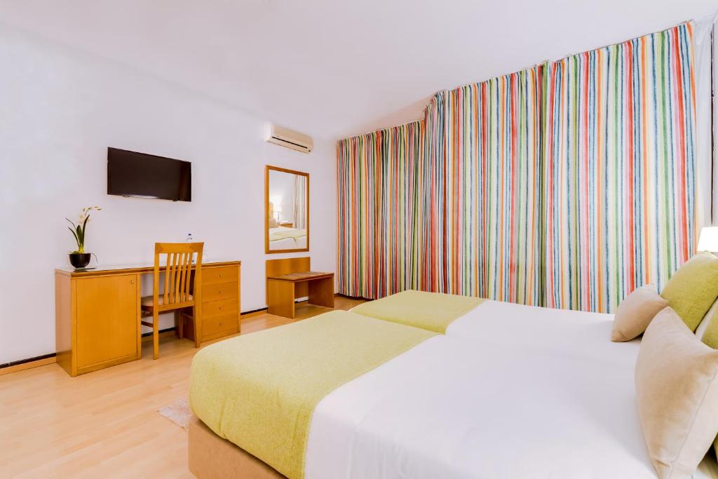 Postel nebo postele na pokoji v ubytování Monica Isabel Beach Club