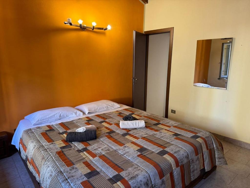 En eller flere senge i et værelse på Pinocchio's house in Ronchi dei Legionari