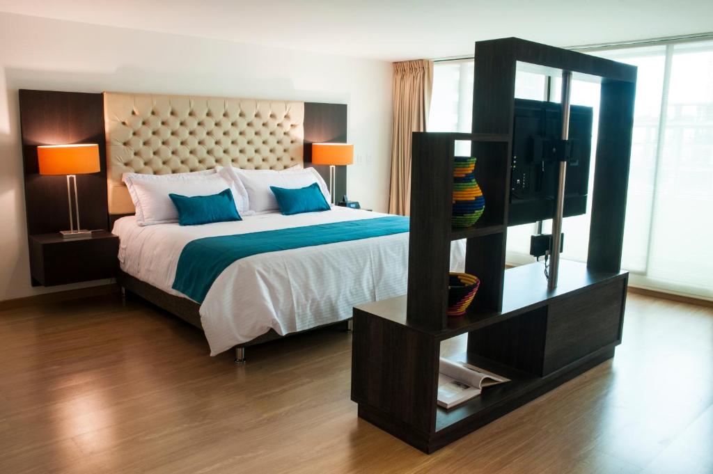 Postel nebo postele na pokoji v ubytování Hotel Grand Park